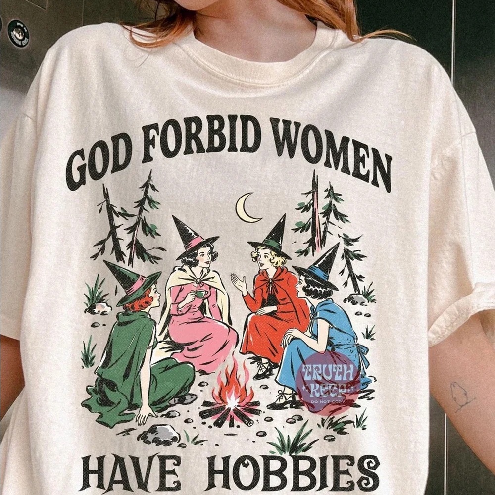 Cream Graphic Tee — 'God Forbid Women Have Hobbies'